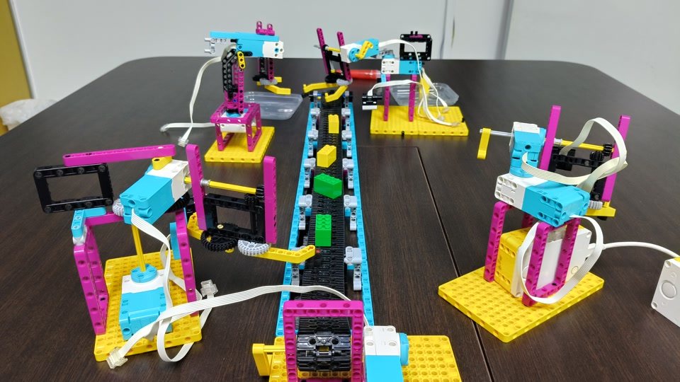Colourful machines built from construction blocks and motors